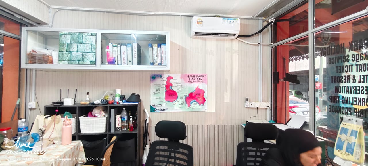 Inside the Save Park Holiday office with Perhentian island map