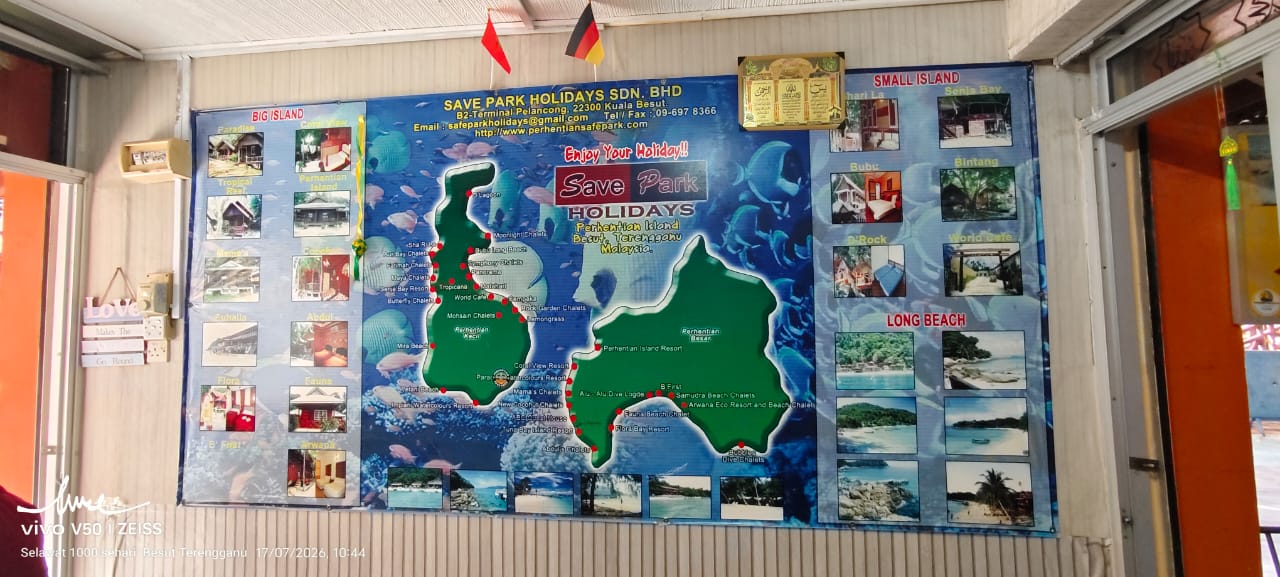Perhentian Island resort and route map board at the office