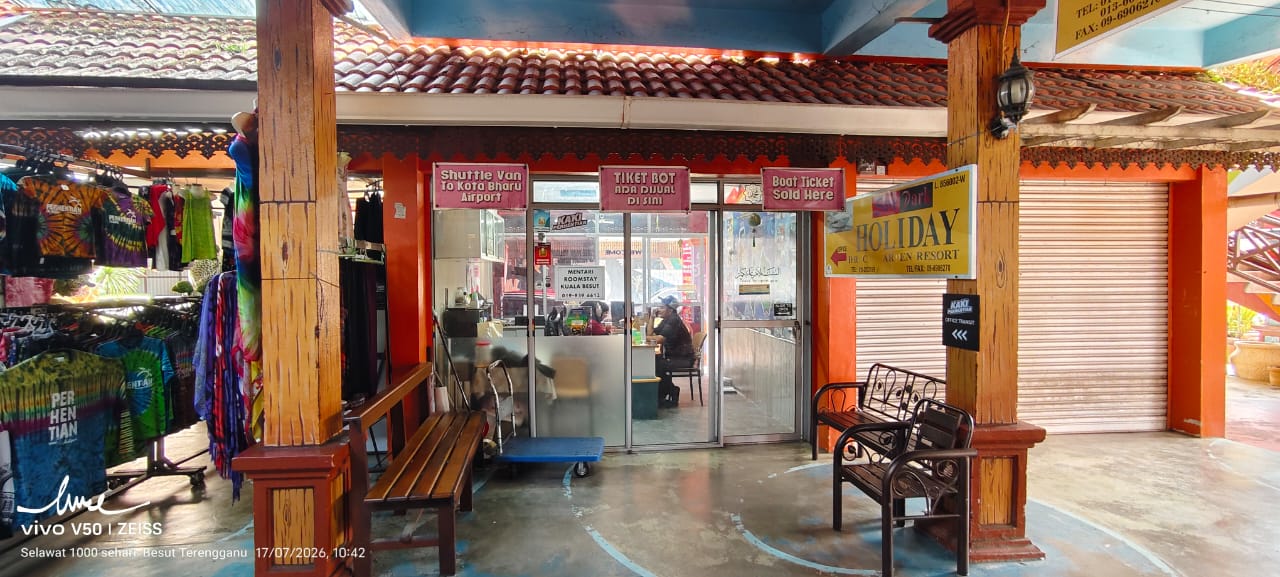 Save Park Holiday shopfront with boat ticket and shuttle van signs