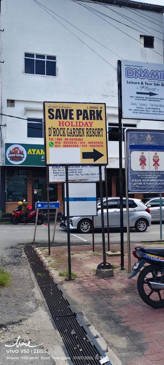 Save Park Holiday signboard beside the terminal