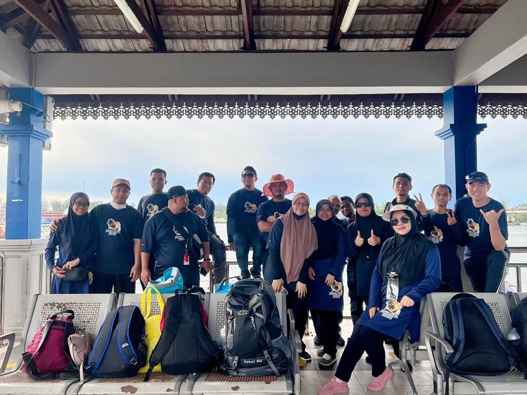 Group of guests gathered at Kuala Besut Jetty before departure